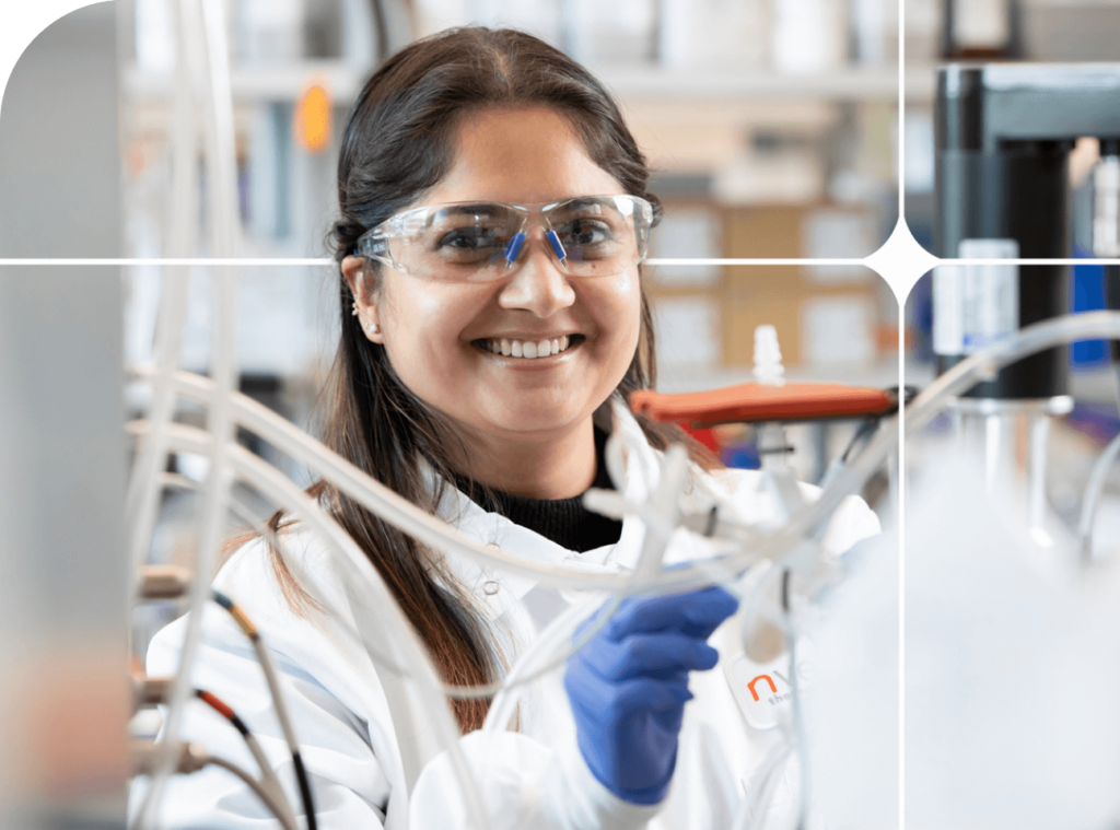 Smiling scientist in a lab